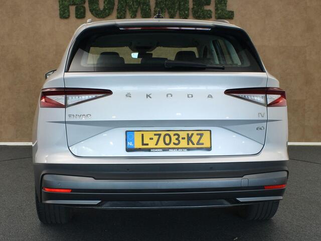 Skoda Enyaq iV 60 - ORIGINEEL NEDERLANDSE AUTO - CRUISE CONTROL - APPLE CARPLAY/ANDROID AUTO - CLIMATE CONTROL - NAVIGATIE FULL MAP - LICHTMETALEN VELGEN 21 INCH - HALFLEDEREN BEKLEDING - STOELVERWARMING VOORZIJDE