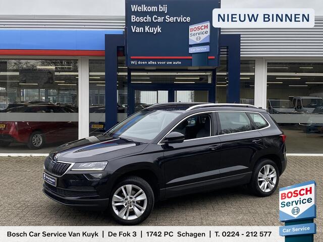Skoda Karoq 1.0 TSI Business Edition / NL-Auto / 116 PK / 99.000 KM / 1e-Eigenaar / Vol-Leder / Trekhaak / LED-verlichting / Climate Control / Cruise Control / PDC V+A / Radio-Bluetooth-Navi / Carplay & Android auto / Draadloze telefoonlader /