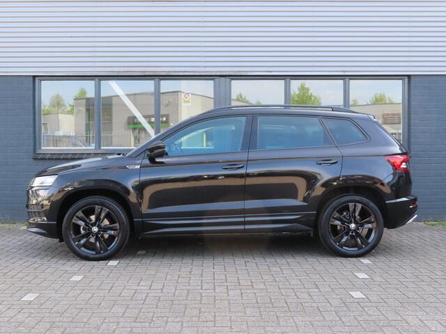 Skoda Karoq 1.5 TSI ACT Sportline Business DSG | verwarmde voorstoelen + achterbank | navigatie |