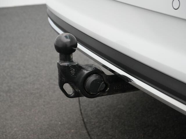 Skoda Karoq 1.5 TSI 150 pk DSG Sportline Business | LED Matrix | Trekhaak | Rondomzicht camera | CANTON sound | Stoel-/achterbankverwarming | Side Assist