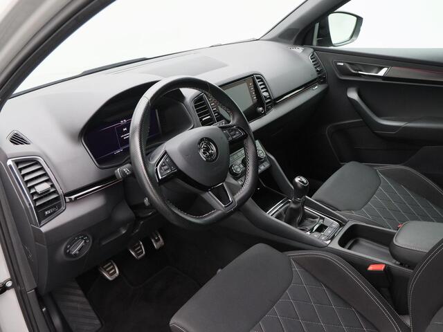 Skoda Karoq 1.5 TSi 150 Pk Sportline Business | LED | Camera | Canton Audio | Adaptive Cruise | Navigatiesysteem | Carplay | Keyless | 19 Inch