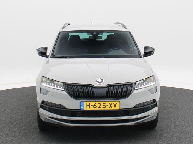 Skoda Karoq 1.5 TSi 150 Pk Sportline Business | LED | Camera | Canton Audio | Adaptive Cruise | Navigatiesysteem | Carplay | Keyless | 19 Inch