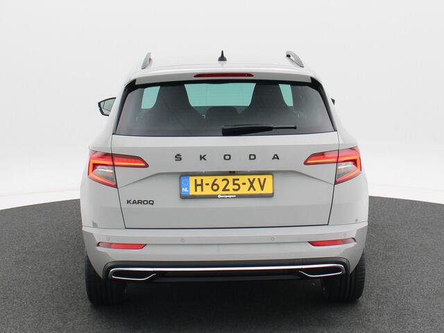 Skoda Karoq 1.5 TSi 150 Pk Sportline Business | LED | Camera | Canton Audio | Adaptive Cruise | Navigatiesysteem | Carplay | Keyless | 19 Inch