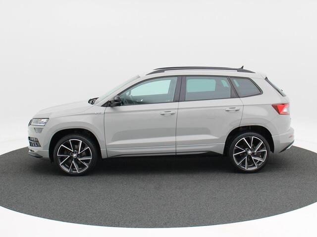 Skoda Karoq 1.5 TSi 150 Pk Sportline Business | LED | Camera | Canton Audio | Adaptive Cruise | Navigatiesysteem | Carplay | Keyless | 19 Inch
