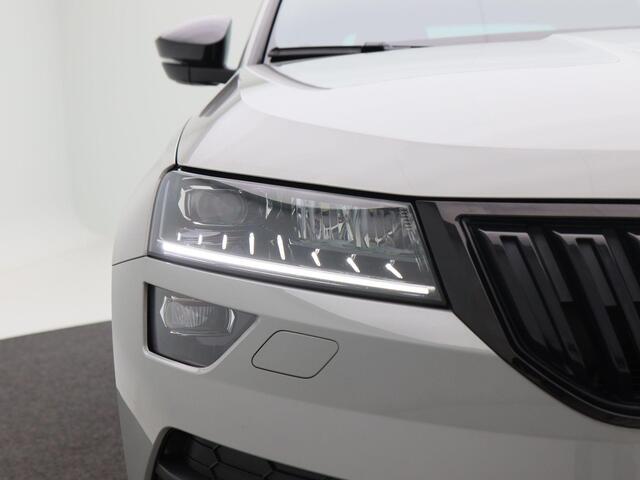 Skoda Karoq 1.5 TSi 150 Pk Sportline Business | LED | Camera | Canton Audio | Adaptive Cruise | Navigatiesysteem | Carplay | Keyless | 19 Inch