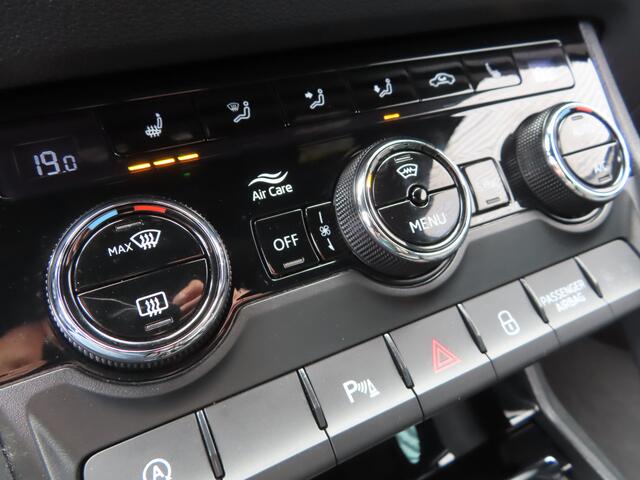 Skoda Karoq 1.5 TSI ACT Sportline Business DSG | voorruitverwarming | verwarmbare voorstoelen + achterbank | stuurwiel verwarmbaar | camera