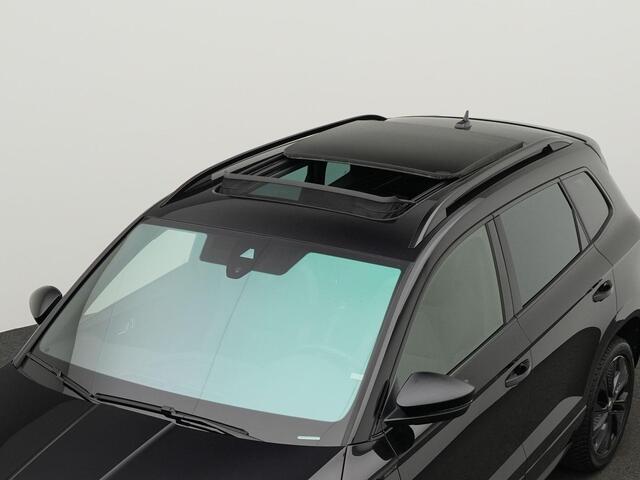 Skoda Karoq 1.5 TSI ACT 150 pk DSG Sportline Business | Panoramadak | Leder | Geheugenstoelen | Adaptief onderstel | Matrix LED | Stuur-/achterbankverwarming