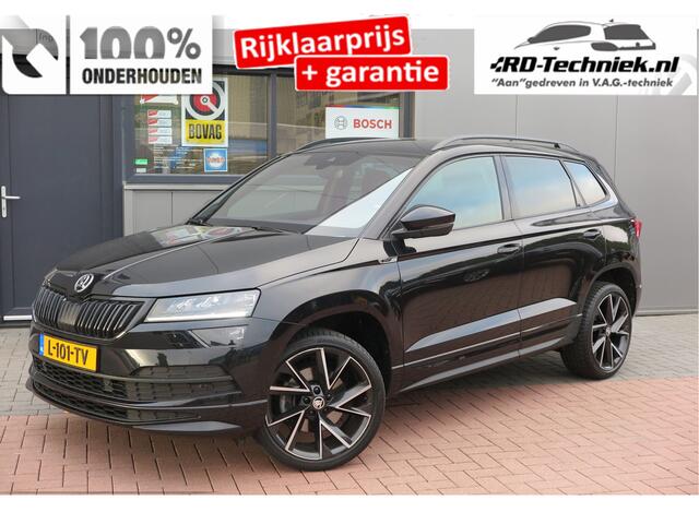 Skoda Karoq 1.5 TSI ACT 150pk Sportline Business Stoelverwarming , Led verlichting , DAB+ radio , Carplay ,Canton sound systeem, Achteruitrijcamera , Parkeersensoren ,Electr. achterklep ,etc.