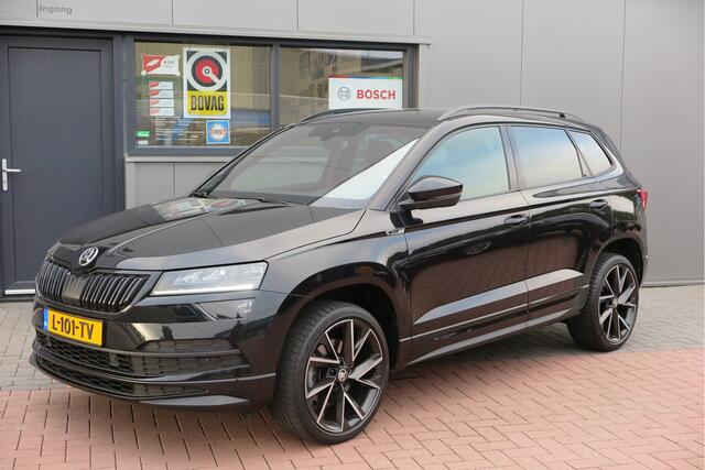 Skoda Karoq 1.5 TSI ACT 150pk Sportline Business Stoelverwarming , Led verlichting , DAB+ radio , Carplay ,Canton sound systeem, Achteruitrijcamera , Parkeersensoren ,Electr. achterklep ,etc.