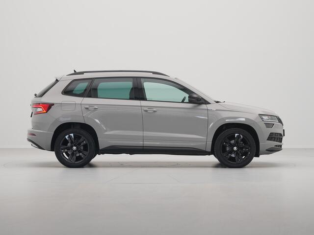 Skoda Karoq 1.5 TSI ACT 150pk DSG Sportline Business Navigatie CantonSound Stoelverwarming Camera Carplay Sideassist