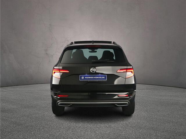 Skoda Karoq Sportline Business 1.5 TSI 150pk DSG Automaat Trekhaak, Panoramadak, Achteruitrijcamera, Adaptive cruise control, Navigatie, Elektrische achterklep