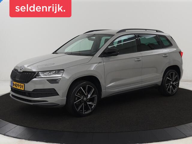 Skoda Karoq 1.5 TSI Sportline | Trekhaak | Stoelverwarming | Camera | Carplay | Virtual Cockpit | Sportstoelen | Navigatie | Full LED | Parkeerhulp | Sfeerverlichting | Climate control | Cruise control