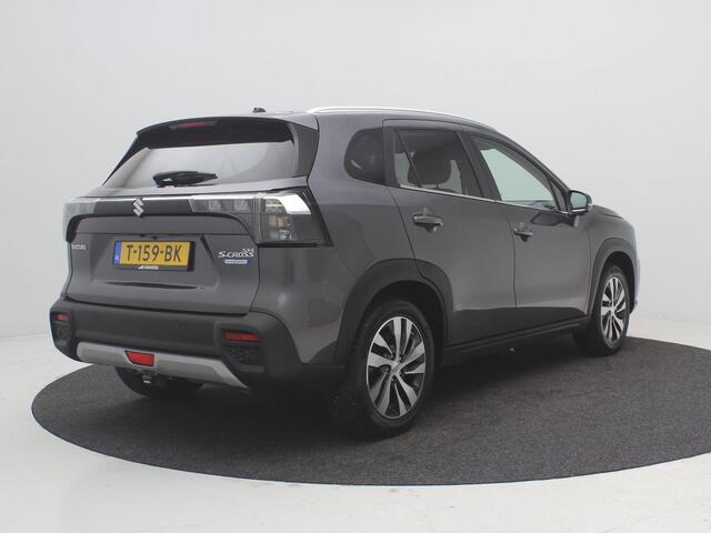 Suzuki S-Cross 1.4 Boosterjet Style Smart Hybrid / Trekhaak Afn. / 1500KG Trekgewicht / Keyless Entry / Panoramadak / Adaptieve Cruise / Apple Carplay / 360 Camera / Historie Bekend / Navigatie / Stoelverwarming voor /