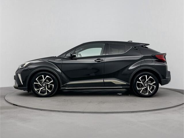 Toyota C-HR 1.8 Hybrid Bi-Tone | NL-Auto | 18' Lichtmetalen velgen | Stoelverwarming | Navigatie | Apple Carplay -/ Android Auto |