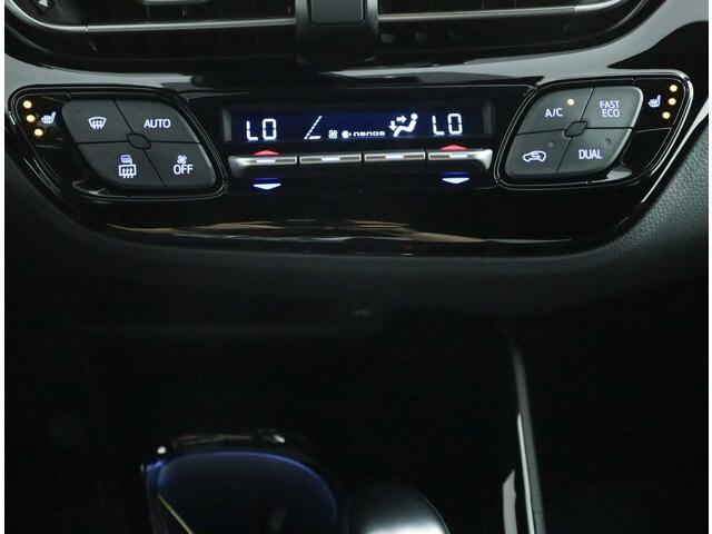 Toyota C-HR 2.0 Hybrid Bi-Tone | Leer | Stoelverwarming | Stuurwiel verwarming |