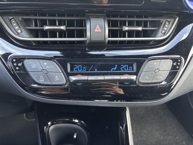 Toyota C-HR 1.8 Hybrid Bi-Tone | Stoel en stuurverwarming | Navigatie | Blindspot | Toyota garantie tot 2028!