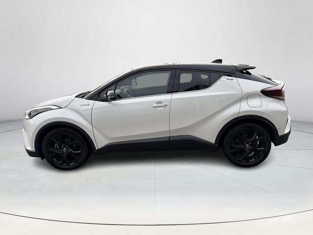 Toyota C-HR 1.8 Hybrid Bi-Tone **NAVIGATIE/ DODEHOEK DETECTIE/ STOELVERWARMING/ ADAPTIEF CRUISE CONTROL**