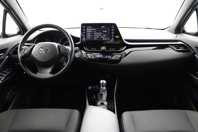 Toyota C-HR 2.0 Hybrid Bi-Tone | Stuur en stoelverwarming | Dodehoek detectie | Apple carplay android auto |