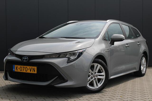 Toyota COROLLA Touring Sports 1.8 Hybrid Business | Incl. 12 maanden garantie | Dealer onderhouden | Afneembare trekhaak | Cruise control | Achteruitrijcamera | Airco | Climate control | Lichtmetalen velgen | Bluetooth