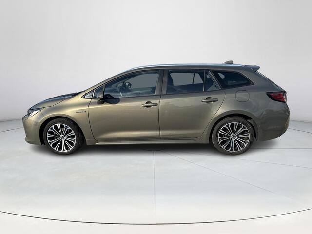 Toyota COROLLA Touring Sports 1.8 Hybrid Style **NAVIGATIE/ HEAD-UP DISPLAY/ STOELVERWARMING/ 36 MAANDEN GARANTIE**