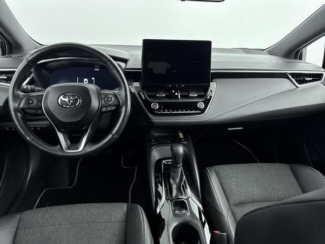 Toyota COROLLA Touring Sports 2.0 High Power Hybrid First Edition | Parkeersensoren | Half lederen bekleding | Navigatie | Stoel / Stuurwielverwarming |