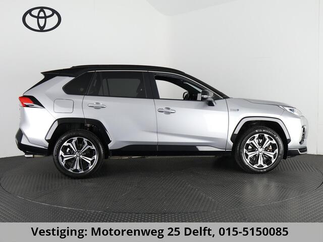 Toyota RAV4 2.5 PLUG-IN AWD STYLE SUZUKI ACROSS 1e EIG. GARANTIE 3-2033.*BI-TONE BODY PACK.HALF LEDER.STOELVERWARMING. CARPLAY. CAMERA.