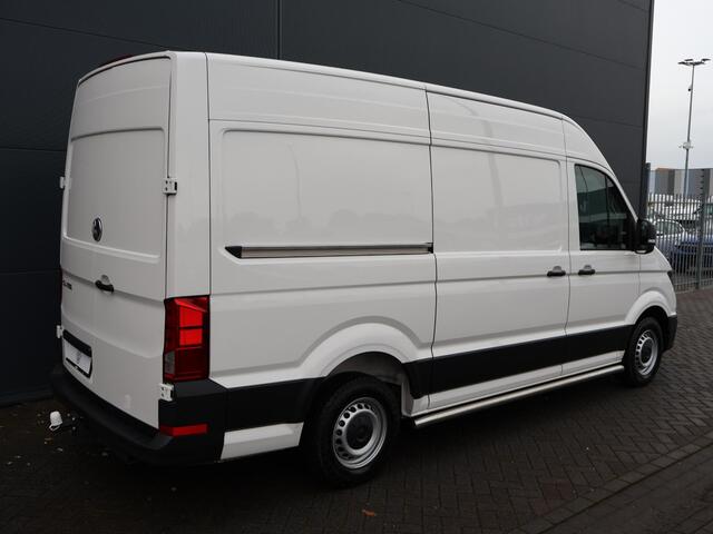 Volkswagen CRAFTER 35 2.0 TDI L3H3 Comfortline EURO VI | 140 PK | Comfortstoel Plus + Armleuningen Bijrijdersbank | Airco | Cruise Control | Navigatie BT DAB+ Apple Carplay / Android Auto | Verwarmbare Voorruit | Parkeersensoren Voor + Achter | Trekhaak
