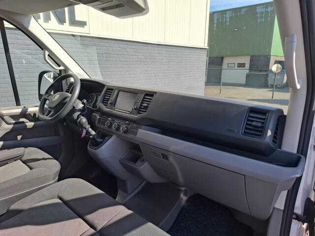 Volkswagen CRAFTER 35 2.0 TDI L3H3 Highline 3p. Navi Airco CruiseControl Verw.Voorruit Regensensor Pdc V+A SchuifdeurRechts Aut.Verlichting Start/Stop Elek.Ramen/Spiegels VerwamerbareSpiegels Verst.Stoel