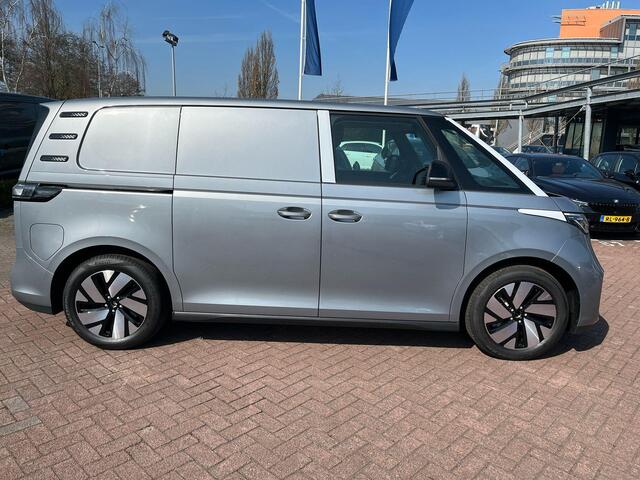 Volkswagen ID. Buzz Cargo Bedrijfswagens Bulli Edition Elektromotor 210 kW (286 pk) 79 kWh | Armsteun voor de voorstoelen, aan beide kanten | Bijrijdersstoel in plaats van bijrijdersbank inclusief ISOFIX | Standaard zijwandbekleding tot aan het dak | Open & Close Pakket |