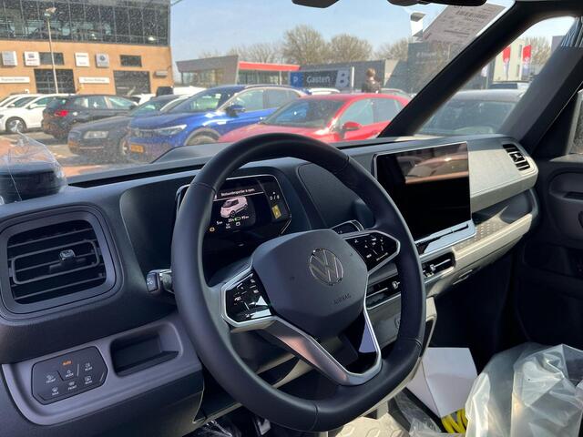 Volkswagen ID. Buzz Cargo Bedrijfswagens Bulli Edition Elektromotor 210 kW (286 pk) 79 kWh | Armsteun voor de voorstoelen, aan beide kanten | Bijrijdersstoel in plaats van bijrijdersbank inclusief ISOFIX | Standaard zijwandbekleding tot aan het dak | Open & Close Pakket |