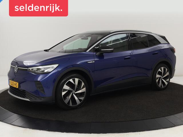 Volkswagen ID.4 First 77 kWh | Trekhaak | Automaat | Sfeerverlichting | Camera | Navigatie | Stoelverwarming | Carplay | LMV 20 inch | LED | Cruise Control | Getint glas | Climate controle
