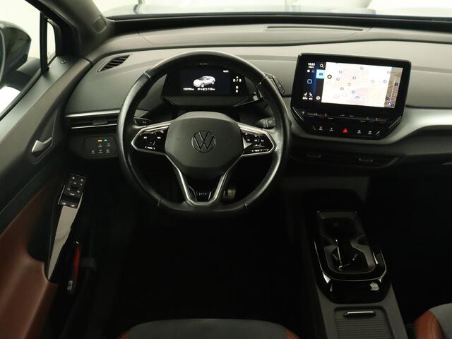 Volkswagen ID.4 First 77 kWh | Trekhaak | Automaat | Sfeerverlichting | Camera | Navigatie | Stoelverwarming | Carplay | LMV 20 inch | LED | Cruise Control | Getint glas | Climate controle