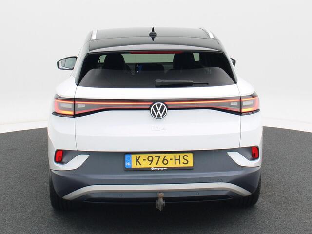 Volkswagen ID.4 First 77 kWh 205 Pk | LED-verlichting | Leder/Alcantara | Adaptive Cruise | Camera | CarPlay | Zwarte Hemel | 20 Inch | 40.702 Km