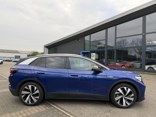 Volkswagen ID.4 First 77 kWh | VAN: 27.900,- VOOR: 24.877,- UW EINDEJAARSVOORDEEL: 3.023,- | CAMERA | 3 FASE | STOEL + STUURVERWARMING | RIJKLAAR INCL 12 MAANDEN BOVAG GARANTIE
