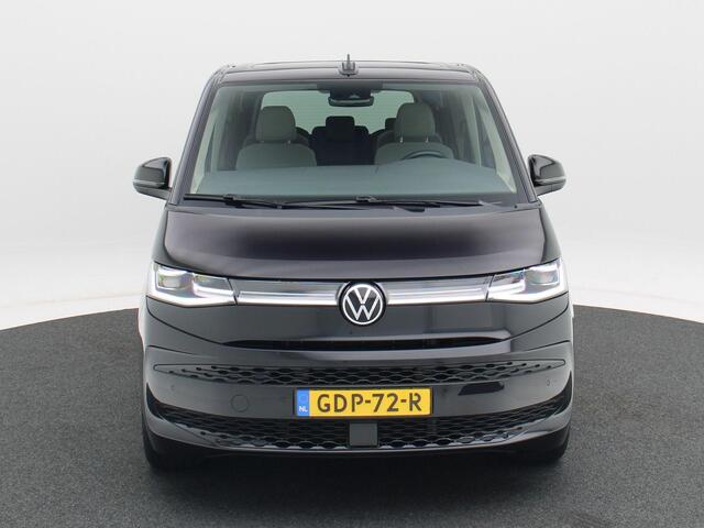 Volkswagen MULTIVAN 1.4 eHybrid L2 Bulli Edition | 7-Persoons | Panoramadak | Trekhaak | Adaptive Cruise | Carplay | Camera | Navigatie | Stoelverwarming | 18 inch | 35.946 Km!!