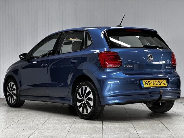 Volkswagen POLO 1.0 TSI BlueMotion/ Trekhaak/ Apple + Android/ 15'' LMV/ Navi/ Airco/ Cruise/ Elek. pakket/ Isofix/ Bluetooth/ Armsteun/ Multi. LEDER. Stuur/ Mistl./ PDC/ Dagrijverl./ Dakspoiler.