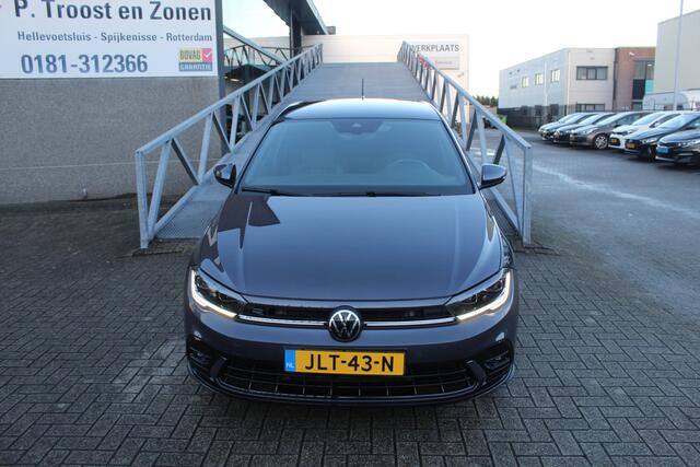 Volkswagen POLO 1.0 TSI 2x R-Line Automaat Navigatie/Virtual cockpit/Adaptive cruise control/Achteruitrijcamera/Parkeersensoren rondom/Apple carplay/Stoelverwarming/LED grill/IQ.light/Climate control/Draadloze telefoonlader/DAB/17''Lichtmetalen velgen.