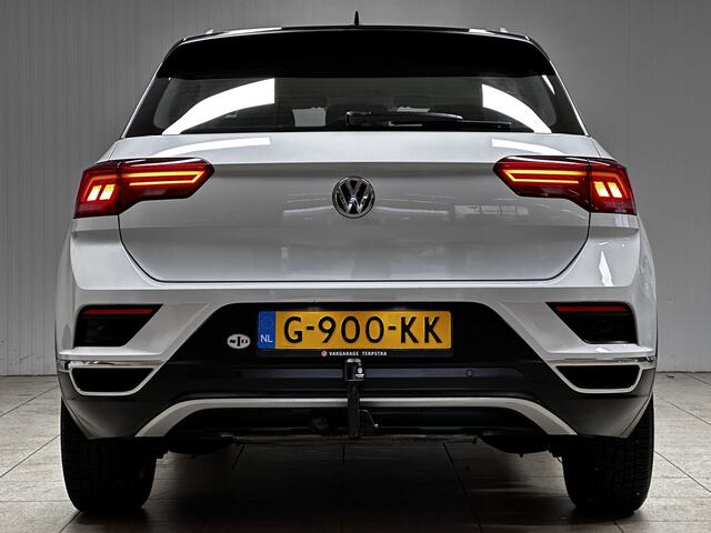 Volkswagen T-Roc 1.5 TSI Style Business/ LED Dagrijverl./ Trekhaak/ Elek.Klep/ DAB+/ Apple+Android/ 16''LMV/ Clima/ Navi/ Cruise/ Bluetooth/ Multi.LEDER.Stuur/ Elek.Pakket/ Isofix/ PDC V+A.