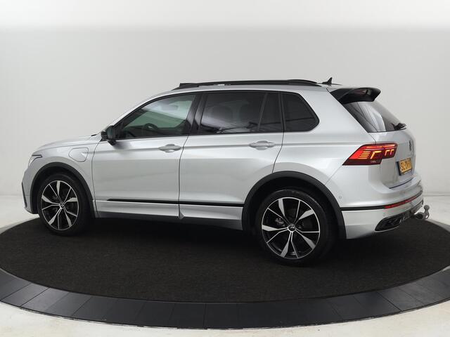 Volkswagen TIGUAN 1.4 TSI eHybrid R-Line | Panoramadak | Leder | Trekhaak | 360 Camera | Sfeerverlichting | Adaptive cruise | 20'' | Carplay | Adaptief onderstel | Matrix LED | Park Assist | PHEV | Plug In