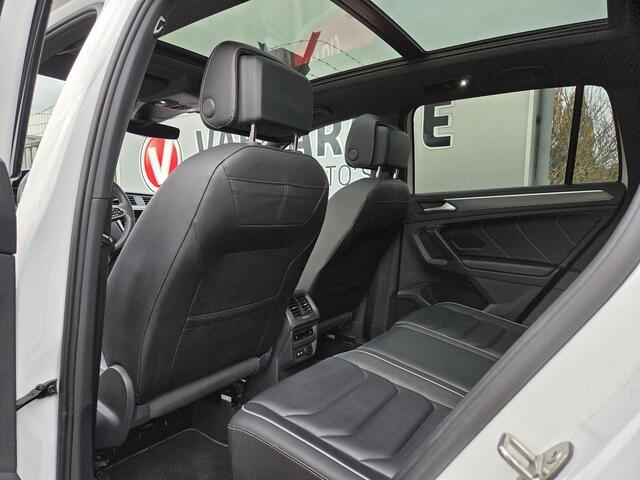 Volkswagen TIGUAN 1.4 TSI eHybrid R-Line Business Black Style 19"/Panoramadak/Trekhaak/Leder + memory/Head-up/Elektrische klep/Dodehoek/Stuur + stoelverwarming/IQ Lights/Adaptieve cruise