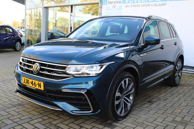 Volkswagen TIGUAN 1.4 TSI eHybrid R-Line Business+ | Incl. 12 maanden Garantie | Panorama dak | Memory stand stoelen | Trekhaak wegklapbaar | Stoel & Stuurverwarming | 360* Camera | Climate controle | Adaptive cruise | Elektrische kofferbakklep | Dodehoek detectie | IQ. Li