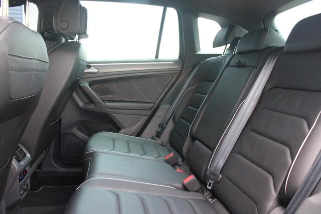 Volkswagen TIGUAN 1.4 TSI 245PK eHybrid R-LINE BUSINESS + | BEKLEDING LEDER VIENNA | PANORAMISCH SCHUIF/KANTEL DAK | ELEKTRISCH WEGKLAPENBARE TREKHAAK | R-LINE INTERIEUR/EXTERIEUR | VERWARMBARE VOORSTOELEN/STUUR | ELEKTRISCH BEDIENBARE VOORSTOELEN MET GEHEUGEN FUNCTIE | AK