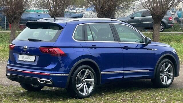 Volkswagen TIGUAN 1.5 TSI R-Line AUTOMAAT 26.000KM!! 1E EIGENAAR!! NAVIGATIE, APPLE CARPLAY, DAB RADIO, STUURVERWARMING, STOELVERWARMING, AMBIËNTEVERLICHTING, DIGITAAL DASHBOARD, DODEHOEK ASSIST, RIJBAAN ASSIST, ADAPTIVE CRUISE CONTROL, ACHTERUITRIJCAMERA, PARKEERHULP V/A,