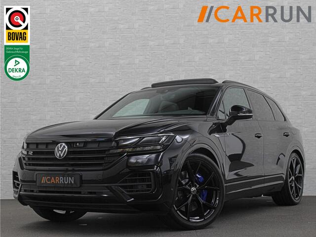 Volkswagen TOUAREG R 3.0 TSI 462PK E-Hybrid | Luchtvering | Puglia Leder | Panorama | ACC | Trekhaak | 22'' | Stoelventilatie | Nachtzicht | Head-Up | Standkachel | Ergo-Comfort | Sfeerverlichting | 4-Zone Clima | Stuurverwarming | Black-Optic | Dodehoek | Lane-Assist | Car
