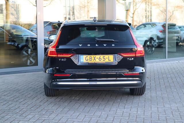 Volvo V60 2.0 T6 Plug-in hybrid AWD Essential Edition | Adaptive Cruise Control met Pilot Assist| Dodehoekdetectie| Stoelverwarming voor + achter| Stuurwielverwarming| Extra getint glas achter| RVS-geborstelde bumperbescherming|