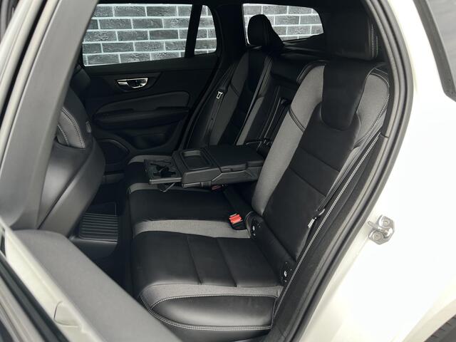 Volvo V60 2.0 T6 Recharge AWD R-Design | Stoel- en stuurwielverwarming | Navigatie | Achteruitrijcamera | Apple Carplay / Android Auto | DAB+ radio | Keyless | LED koplampen | Sportstoelen | Elektrische stoelverstelling |