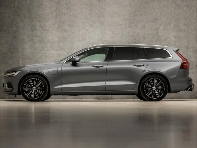 Volvo V60 2.0 T6 Recharge AWD Sport 390Pk Automaat (APPLE CARPLAY, GROOT NAVI, CAMERA, KEYLESS, SPORTSTOELEN, ADAPTIVE CRUISE, TREKHAAK, ELEK ACHTERKLEP, NIEUWSTAAT)