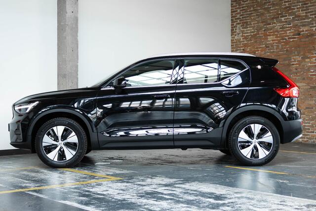 Volvo XC40 T4 Recharge Inscription | 360° Parkeercamera | Semi Electrische Wegklapbare trekhaak | 4-Seizoenenbanden | Draadloze telefoonlader | Panoramadak | Harman Kardon Premium Audio | Stoel en Stuurwielverwarming | Parkeersensoren voor + achter | Parkeerverwarmi