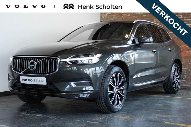 Volvo XC60 B5 Automaat Business Pro | Trekhaak | 360° parkeercamera | Adaptive cruise control | BLIS | Stoelverwarming | Stuurwielverwarming | Navigatie | Maroon lederen bekleding | Comfortstoelen |