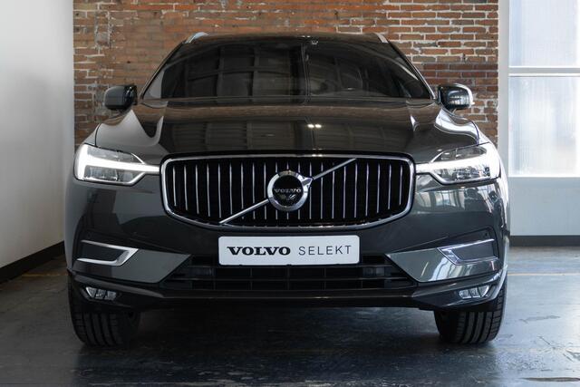 Volvo XC60 B5 Automaat Business Pro | Trekhaak | 360° parkeercamera | Adaptive cruise control | BLIS | Stoelverwarming | Stuurwielverwarming | Navigatie | Maroon lederen bekleding | Comfortstoelen |